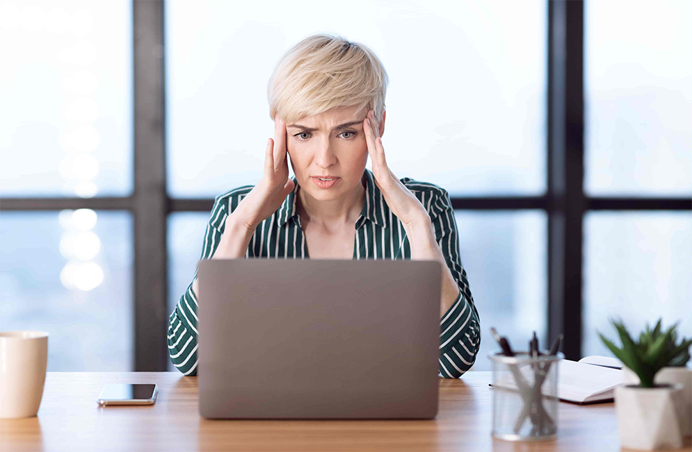 Woman stressed about Social Media Strategy
