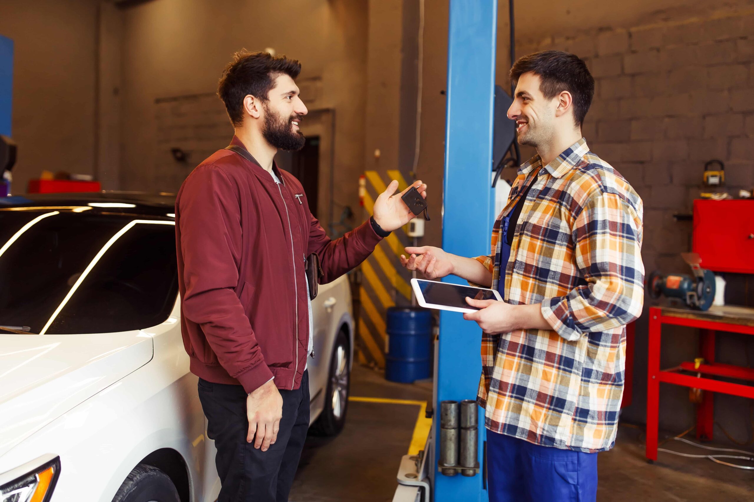 Local repairman interacting with a customer, showcasing collaboration between businesses and the community.